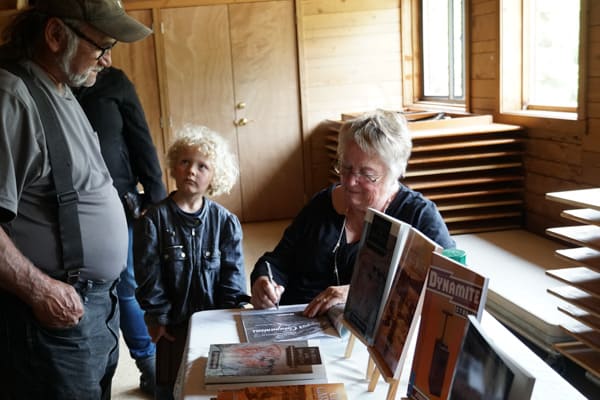 Judith Williams signing her book, Raincoast Chronicles 24: Cougar Companions.
